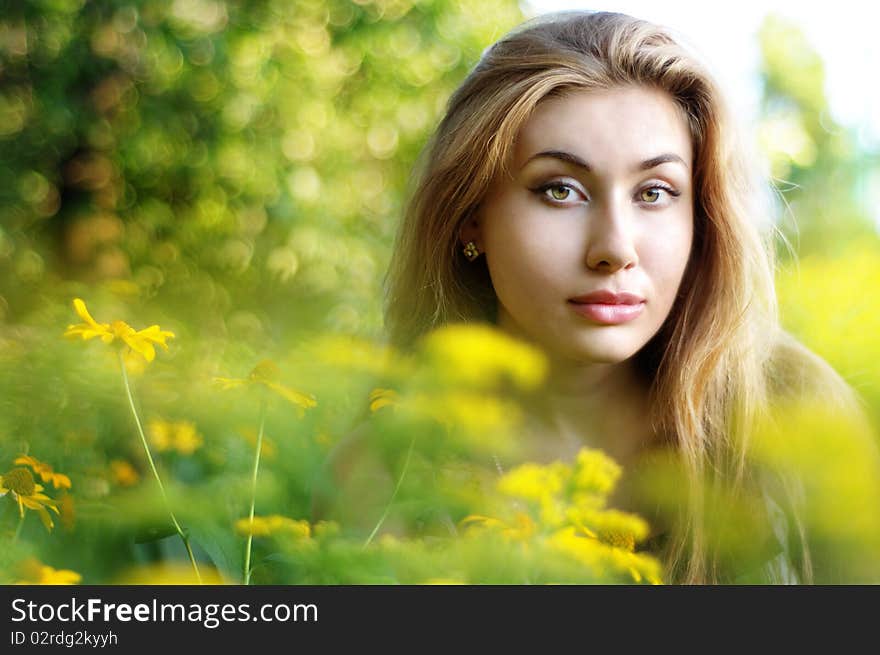 Girl with yellow flowers