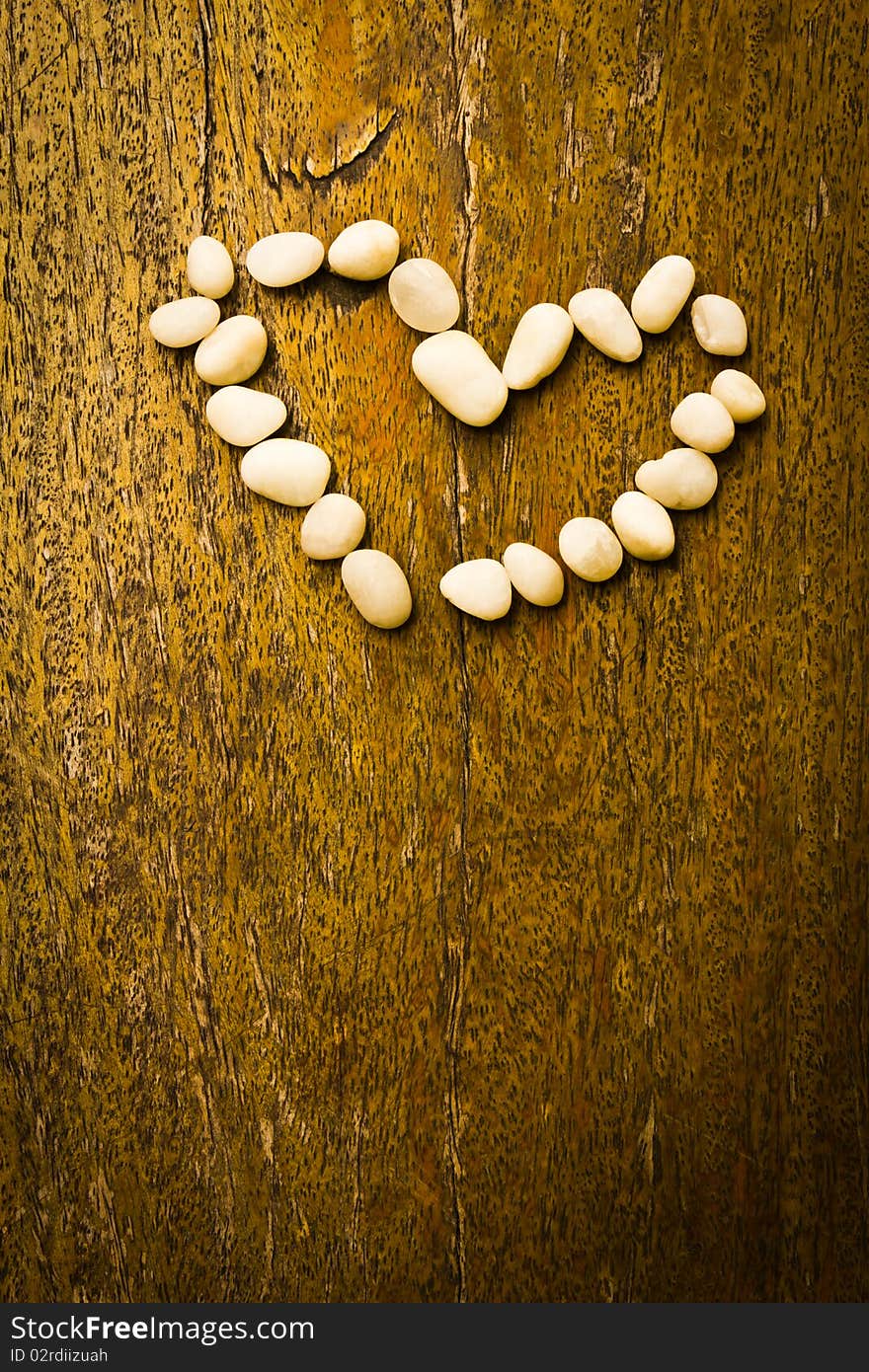 Heart on the wood background