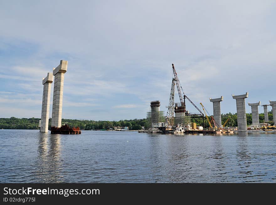 Building reinforced concrete bridge with highway on Dnepr river. Building reinforced concrete bridge with highway on Dnepr river