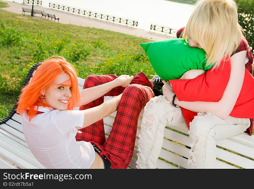 Two teenage girls at park