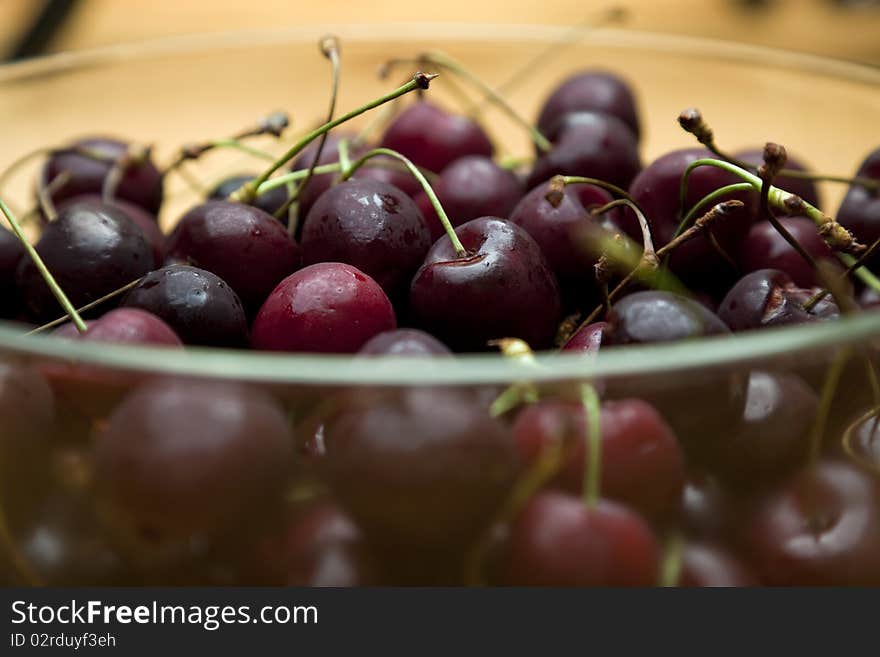 Close-up of cherries in glass bowl