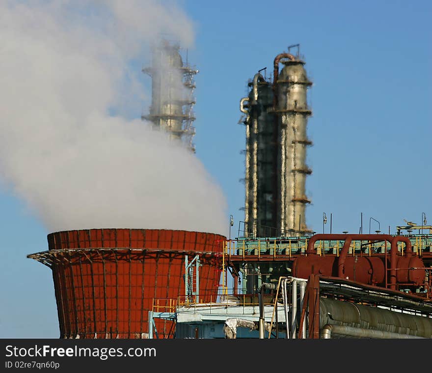 Refinery factory against the dark blue sky