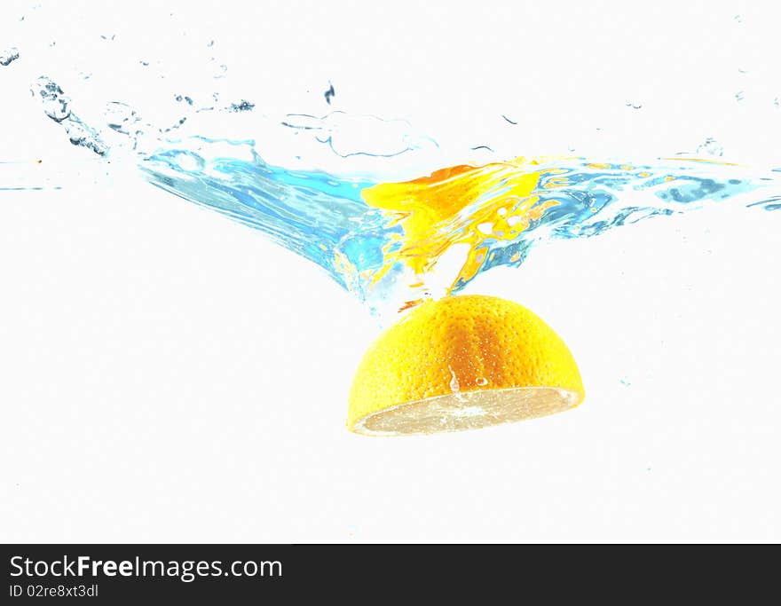 Orange in streaming water