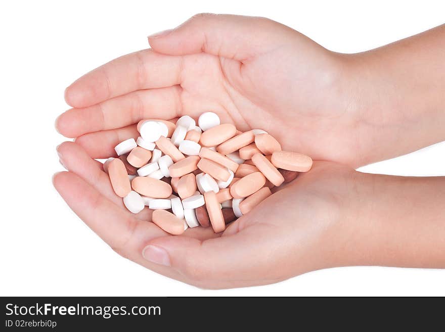 Medical Pills In A Female Hand, Isolated