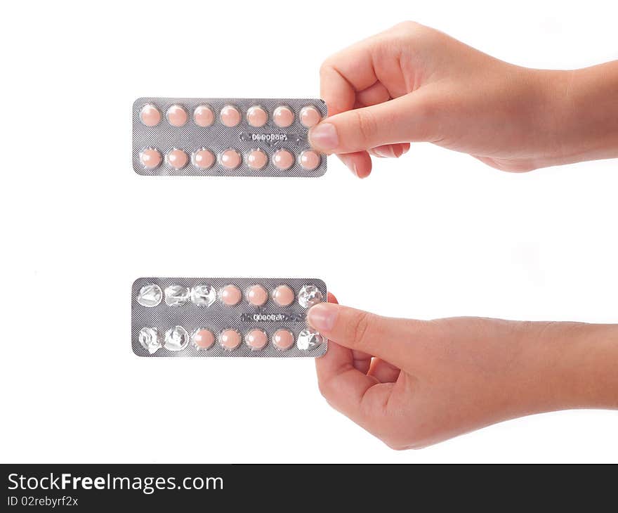 Two medical pills container on a female handl