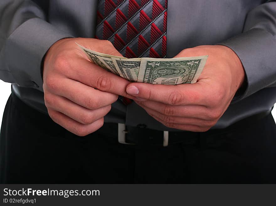 The businessman in a grey shirt and a tie has control over money. The businessman in a grey shirt and a tie has control over money.