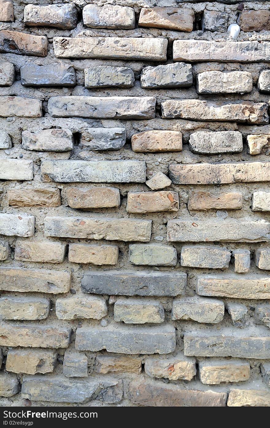 Old brick fortress wall in Vilnius.It is made by medieval masons