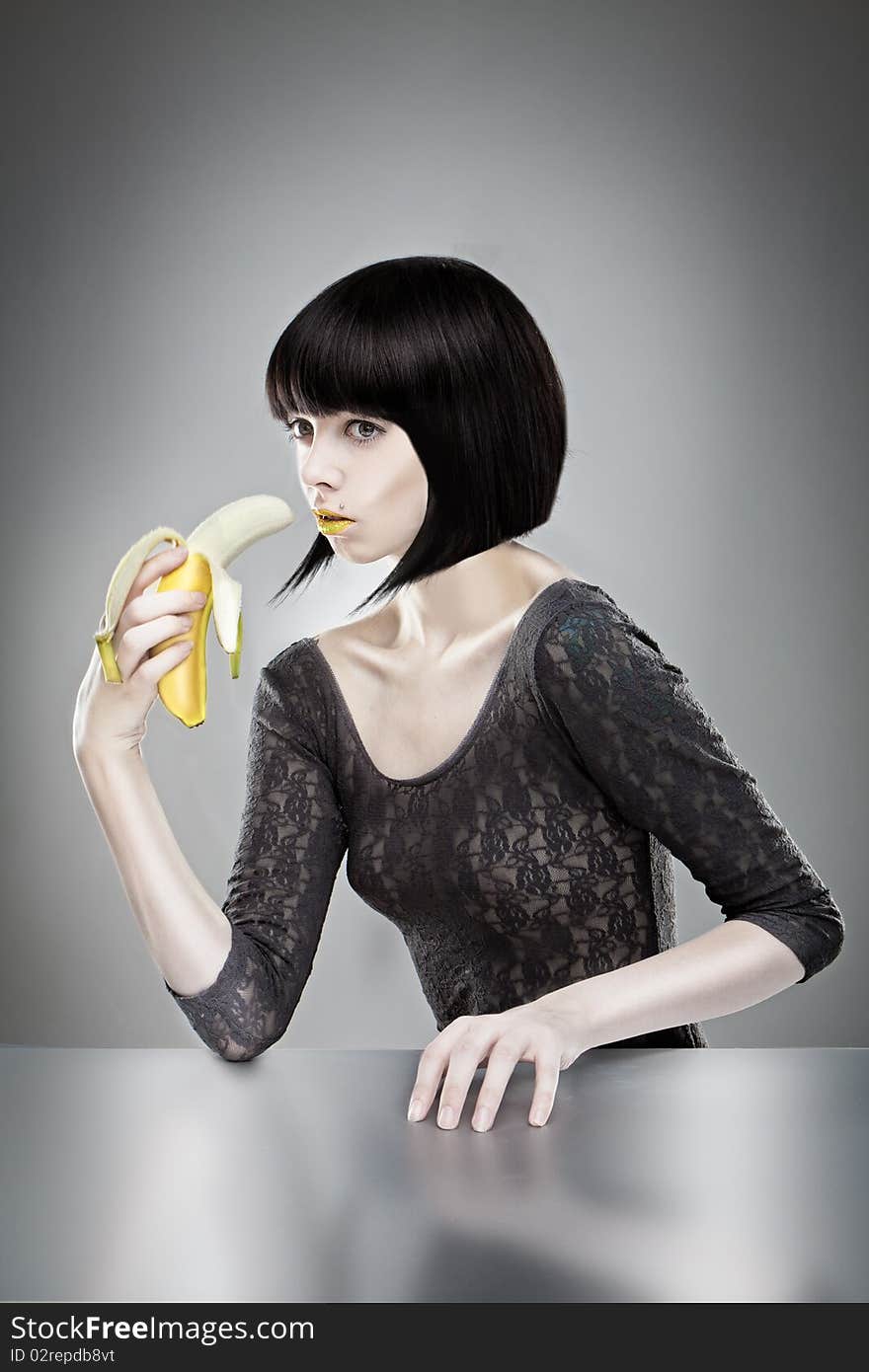 Brunette Holding Banana