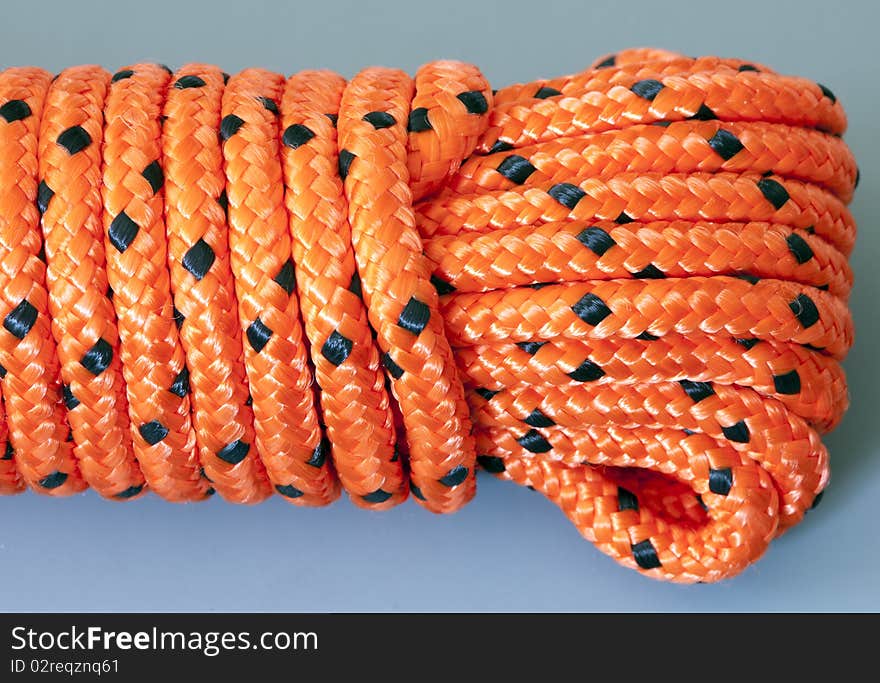 Rope close up of orange climbing rope