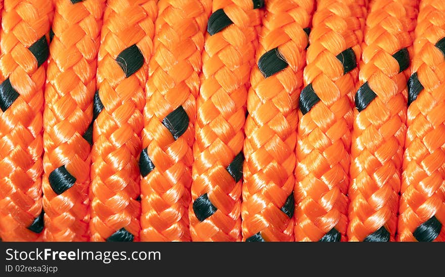 Rope close up of orange climbing rope