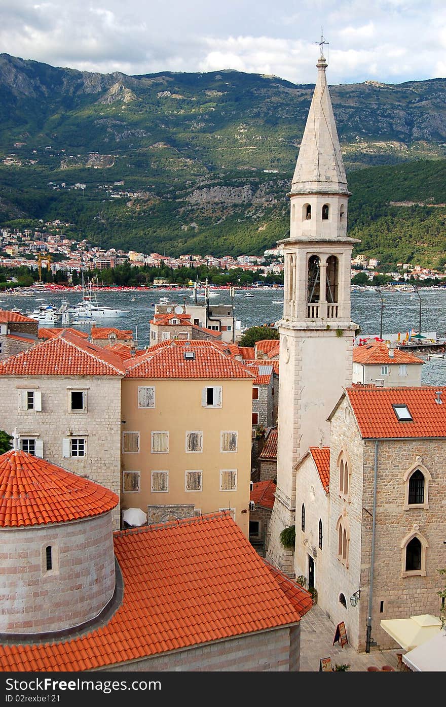 The Old Town of Budva with church of St. John The Baptist and the Church of the Holy Trinity with Iconostasis in Montenegro. The Old Town of Budva with church of St. John The Baptist and the Church of the Holy Trinity with Iconostasis in Montenegro