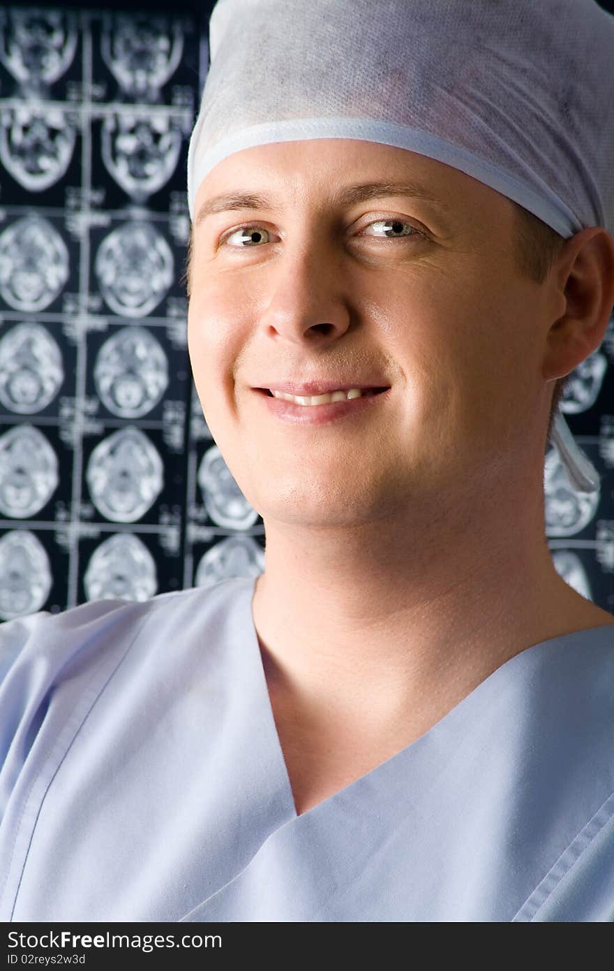 Portrait of smiling doctor in blue. Portrait of smiling doctor in blue