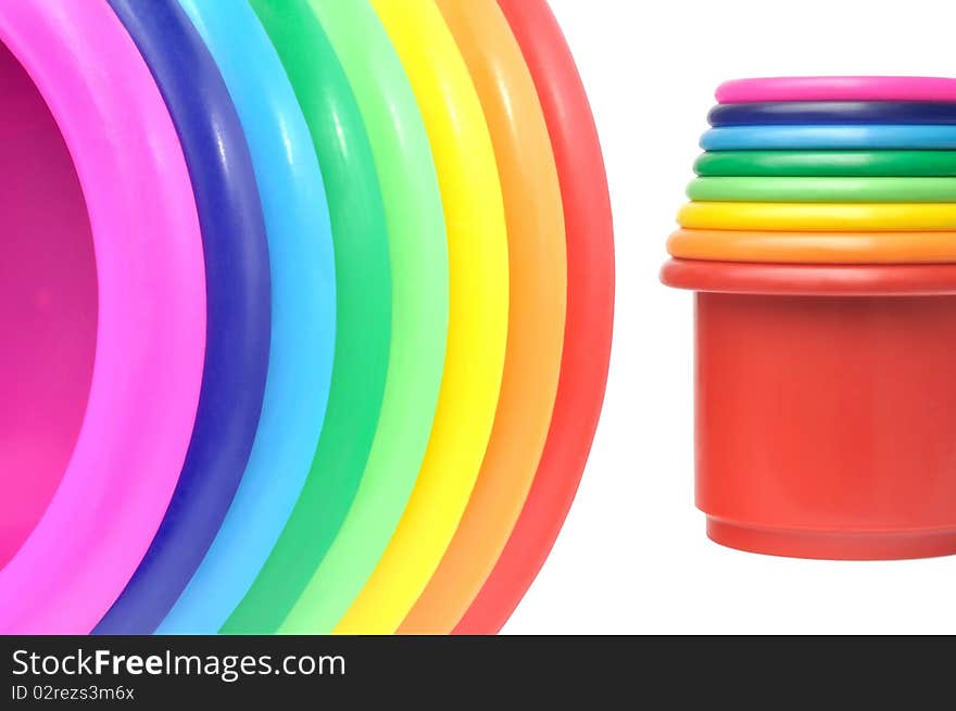 Colored plastic flower pots against white background. Colored plastic flower pots against white background