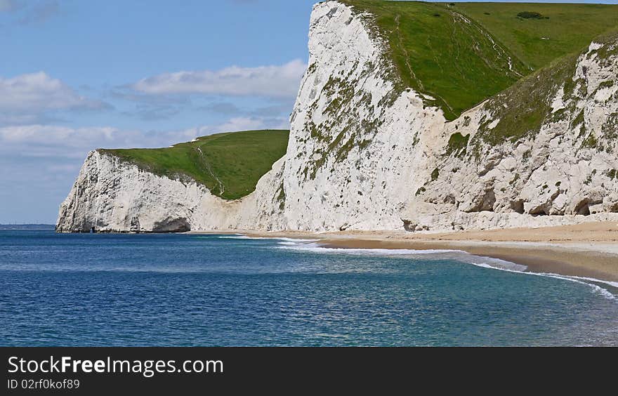 Beach and cliffs.