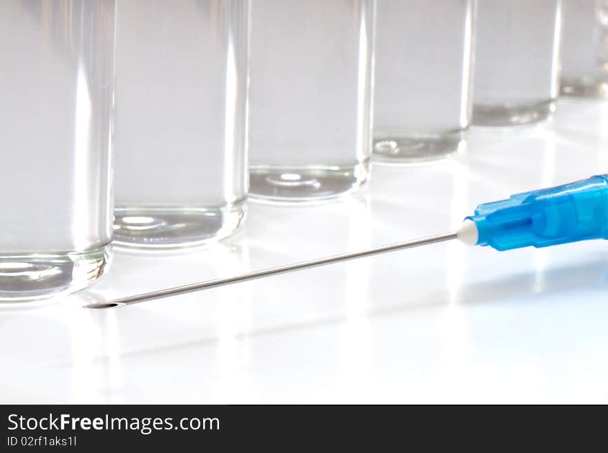 Single use syringe against white background