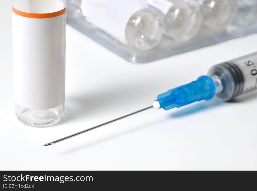 Single use syringe against white background