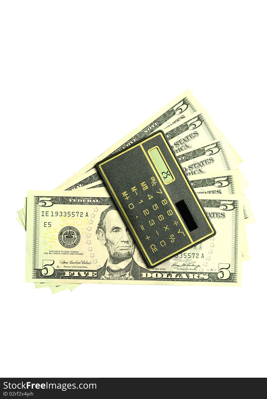 Calculator and dollar bills on white background