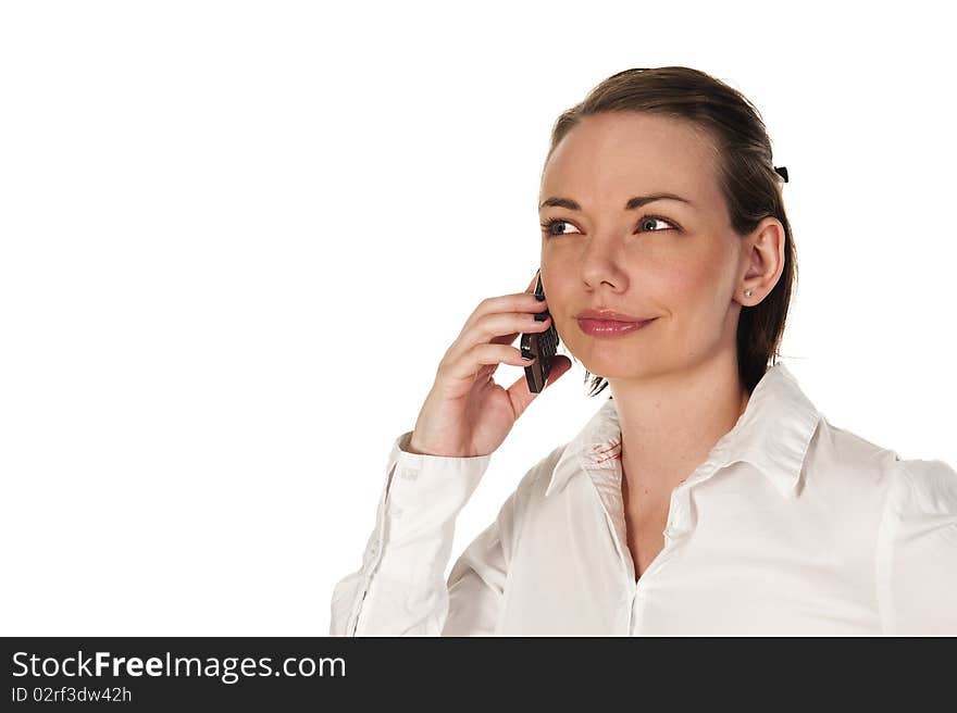 Beautiful girl listening intensely to the phone conversation. Beautiful girl listening intensely to the phone conversation