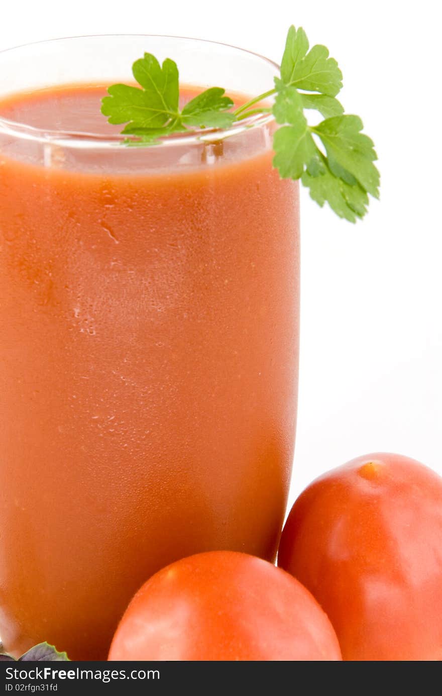 Small tomatoes and juice on white background. Small tomatoes and juice on white background