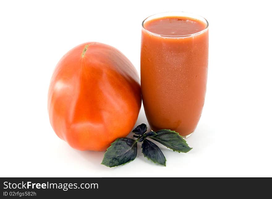 Big tomato and juice on white background. Big tomato and juice on white background