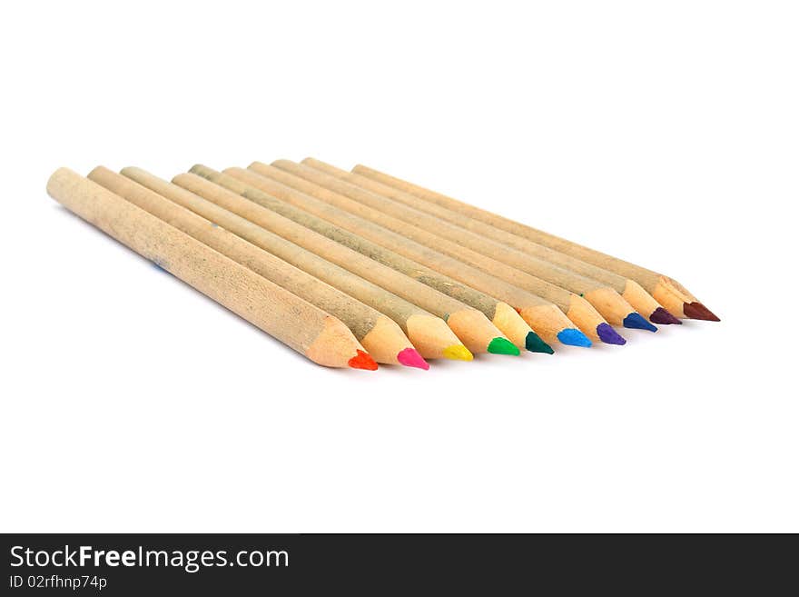 Wooden color pencils isolated on a white background