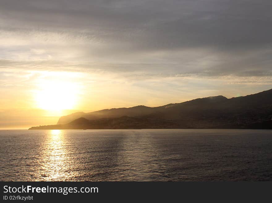 The sun setting over an Caribbean Island. The sun setting over an Caribbean Island