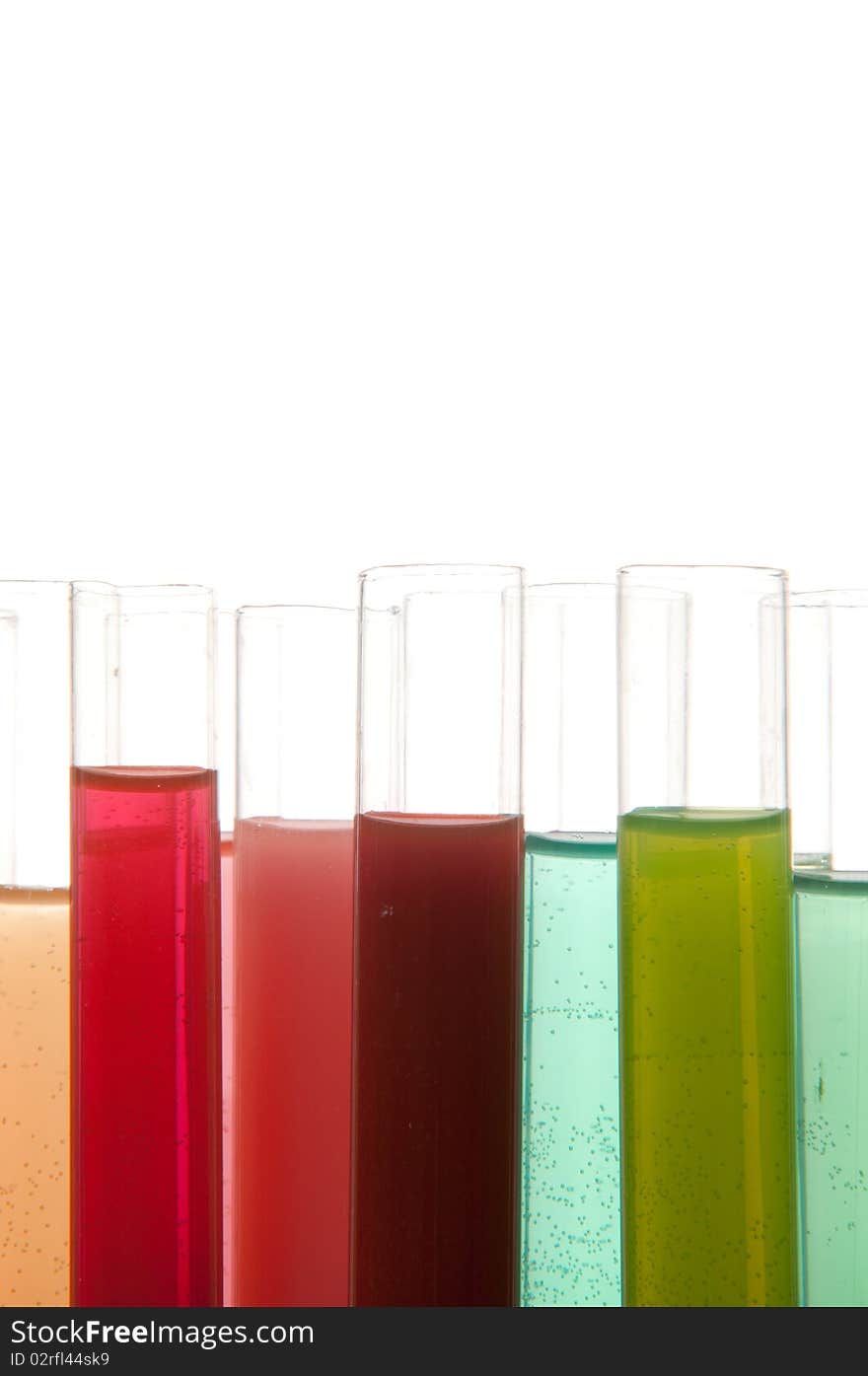 Tubes with different colored chemicals. Tubes with different colored chemicals