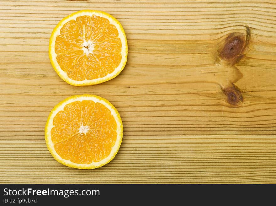 Orange on wood background