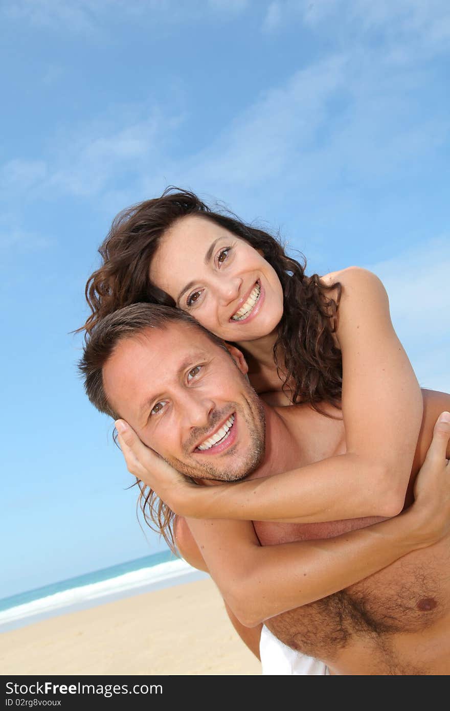 Couple having fun at the beach. Couple having fun at the beach