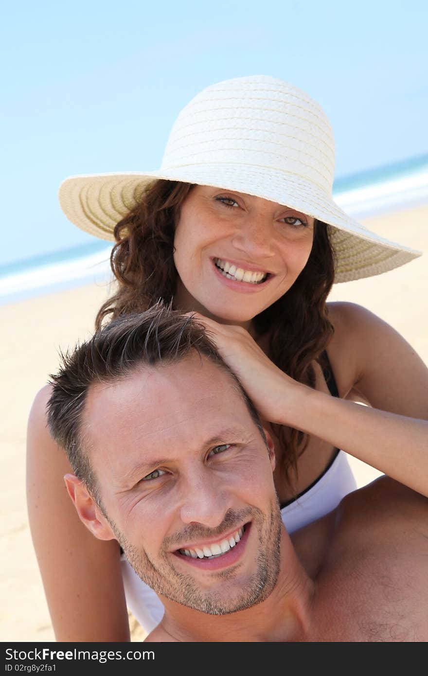 Closeup of couple having fun at the beach. Closeup of couple having fun at the beach