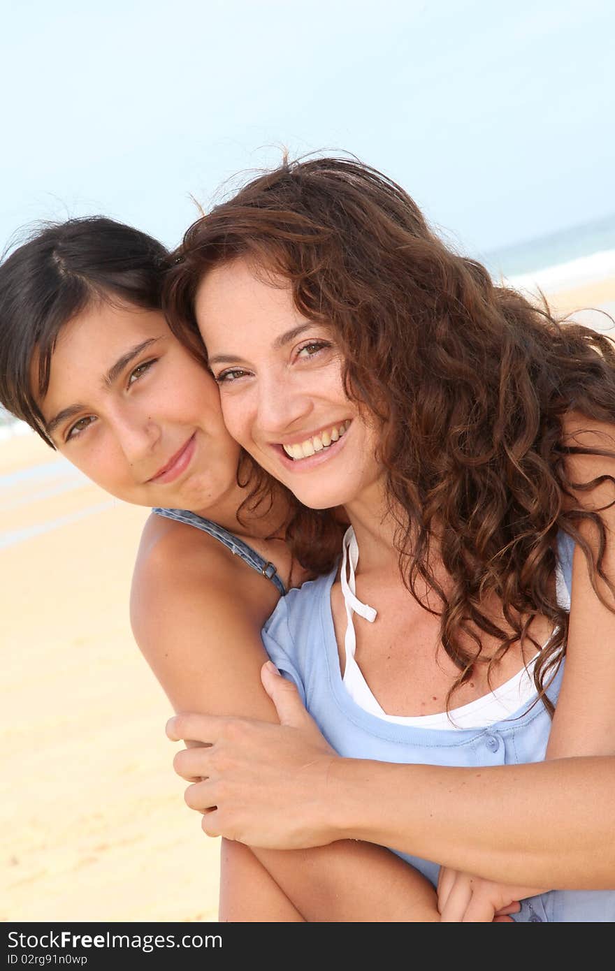 Mother and daughter at the beach. Mother and daughter at the beach