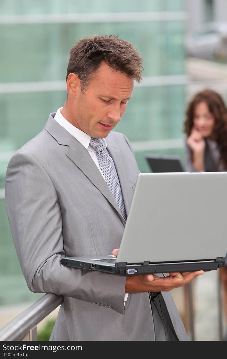 Businessman working on laptop computer