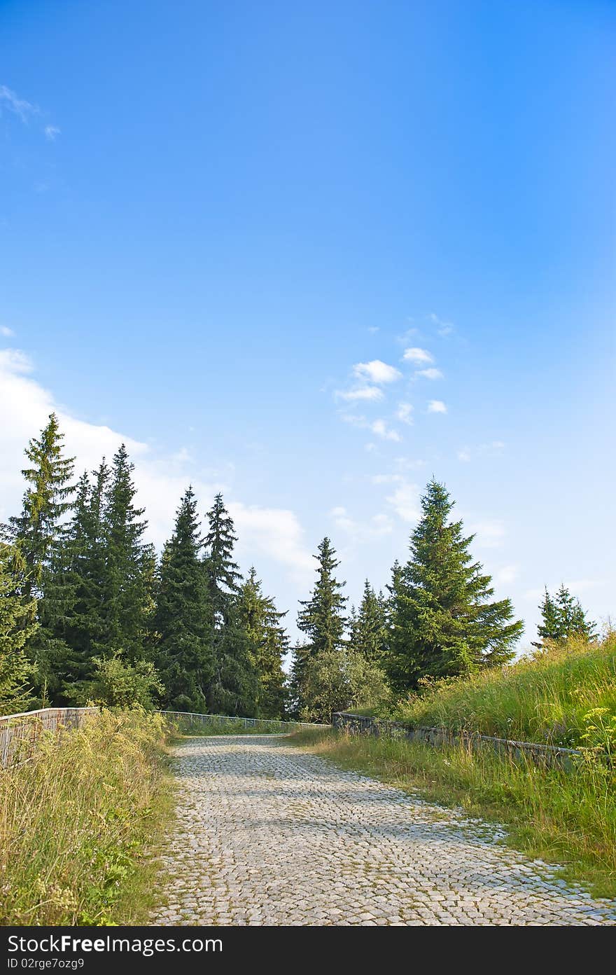 Paved winding road high in the mountains. Paved winding road high in the mountains