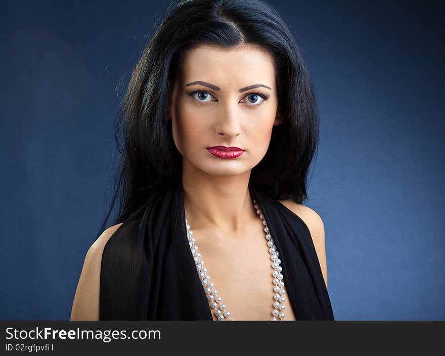 Portrait of elegant beautiful woman wearing jewelry.