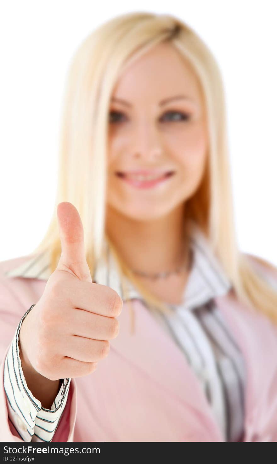 Happy blond female showing thumbs up sign, isolated, focus on hand. Happy blond female showing thumbs up sign, isolated, focus on hand