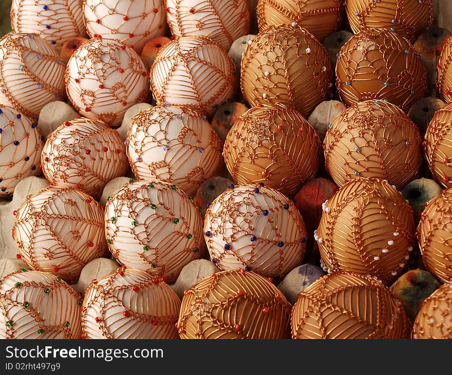 Easter eggs decorated with copper wire