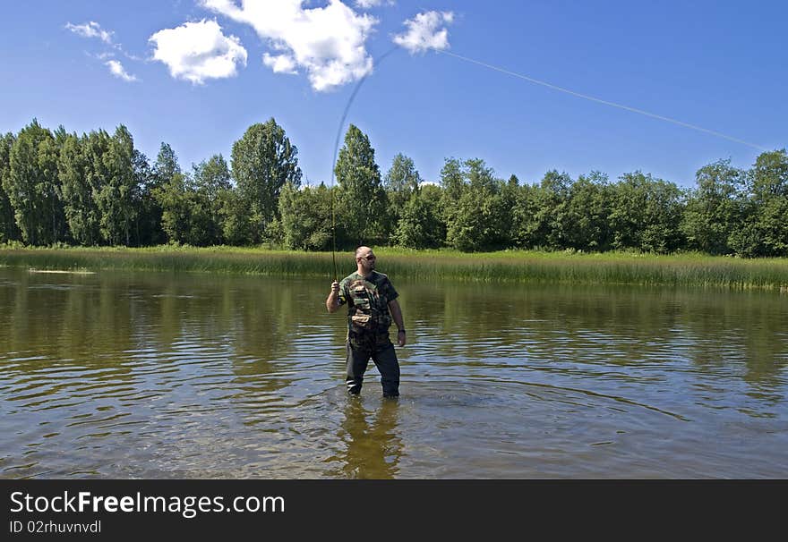 Photo of the fisherman on the river