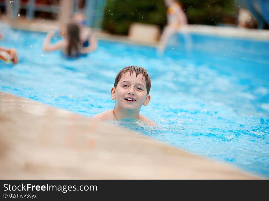 Little swimmer in the swimming pool. Little swimmer in the swimming pool