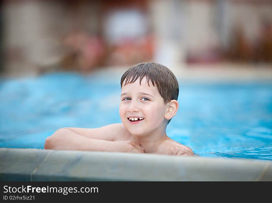 Little swimmer in the swimming pool. Little swimmer in the swimming pool