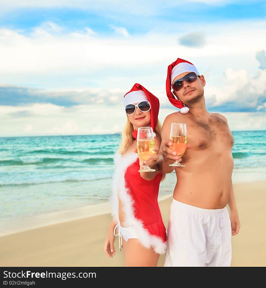 Couple celebrates Christmas at the tropical beach