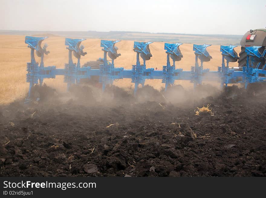 Workable plow with soil on furrows.