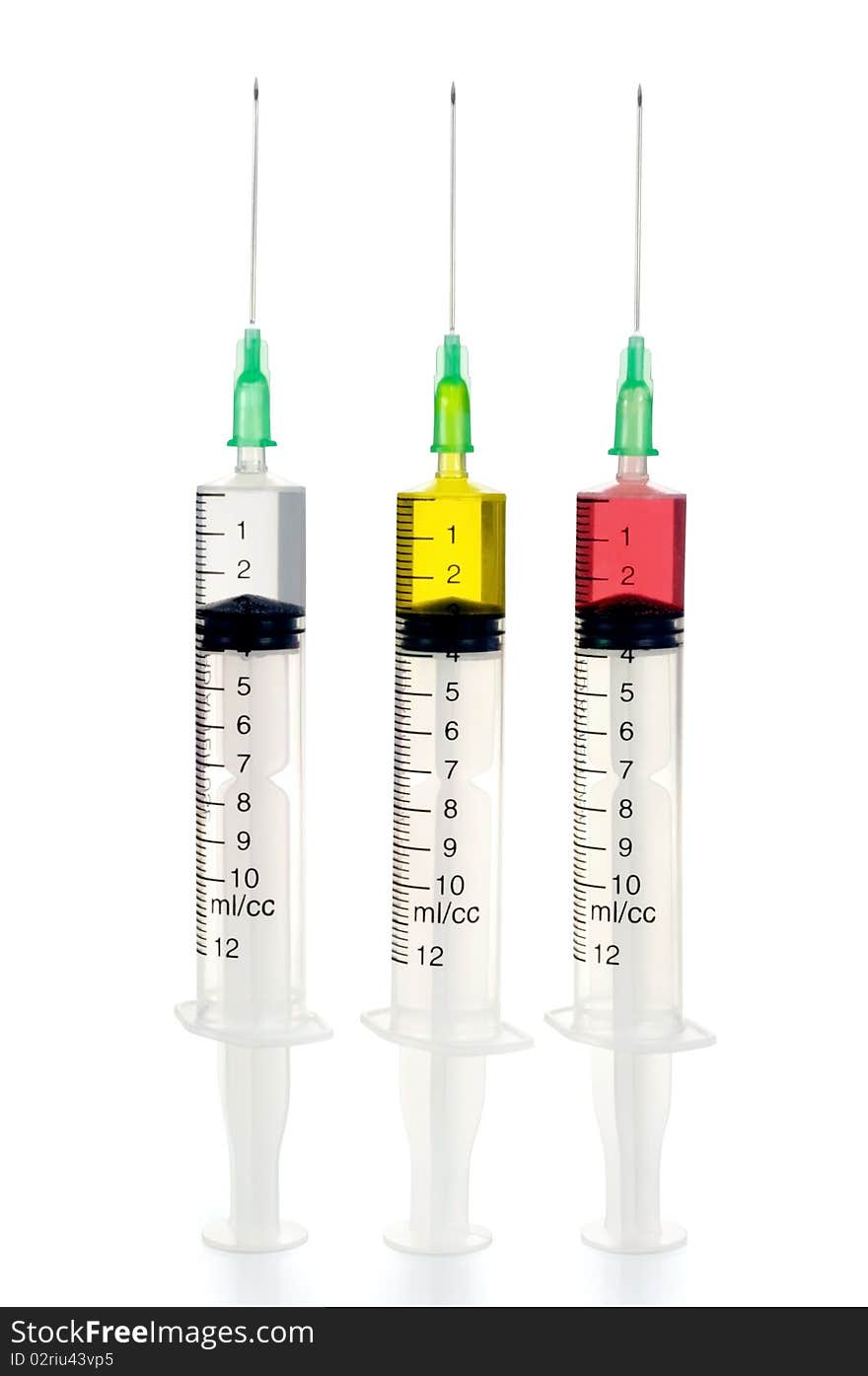 Three disposable syringe against white background