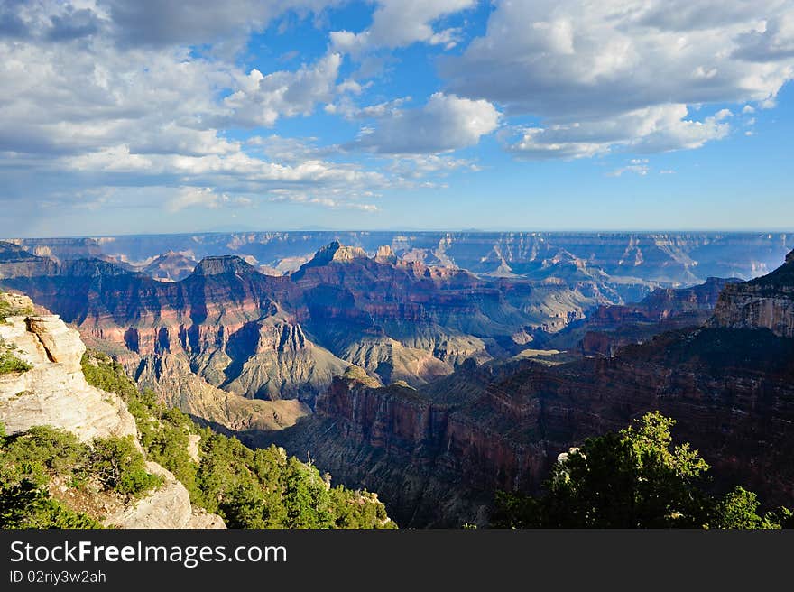 Shadows moving over the North Rim of the the Grand Canyon. Shadows moving over the North Rim of the the Grand Canyon