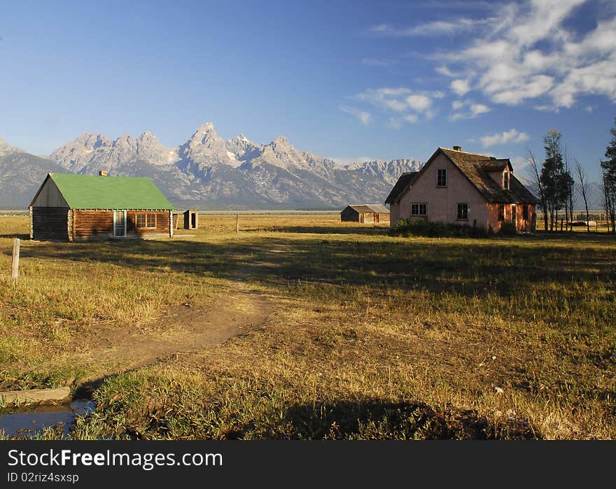 Landscape of a barn with mountains. Landscape of a barn with mountains