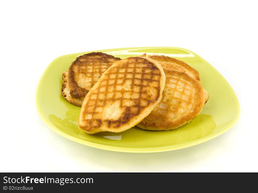 Thick pancake on green plate