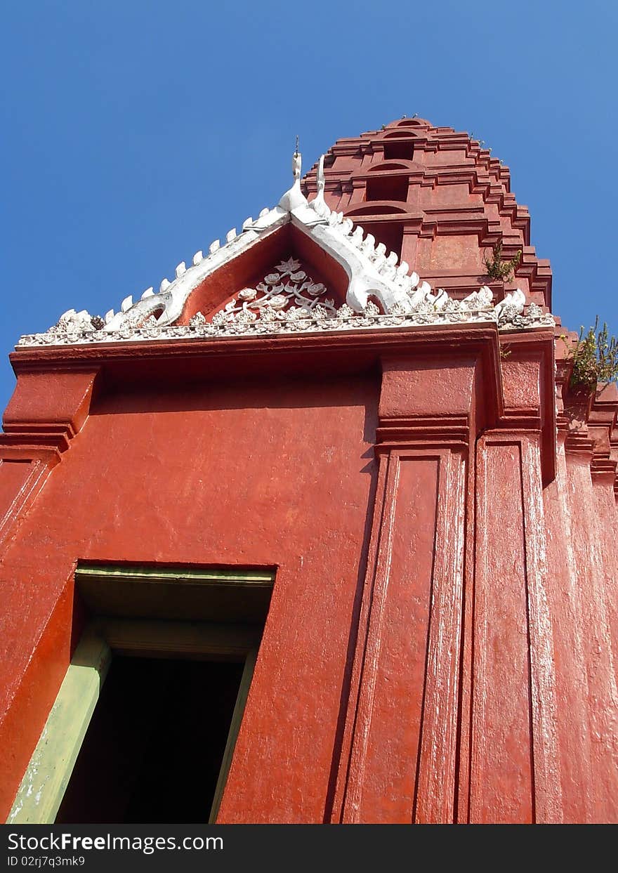 Ancient Big red pagoda and buddha in thai temple