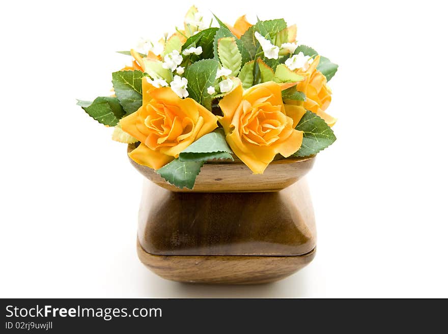 Wood bowl with bunch of flowers