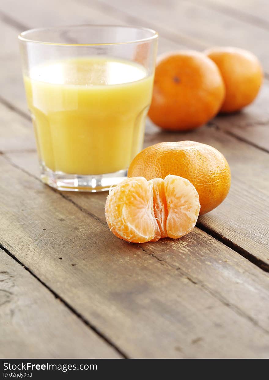 Mandarin And Glass Of Juice