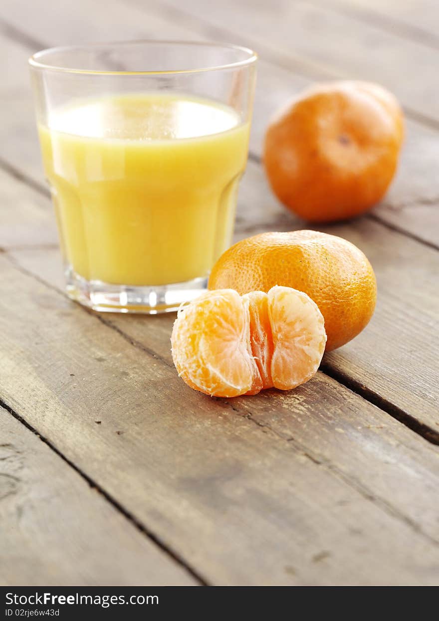 Mandarin And Glass Of Juice