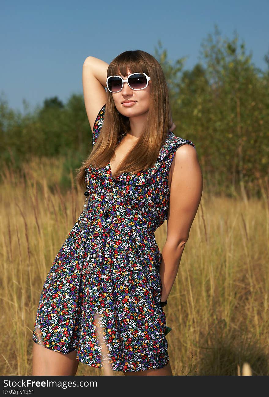 The beautiful girl in the field